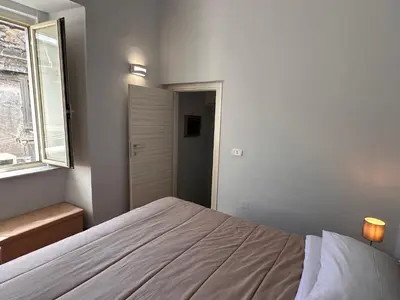 Letto o letti in una camera di Anima Azzurra - Historic Center