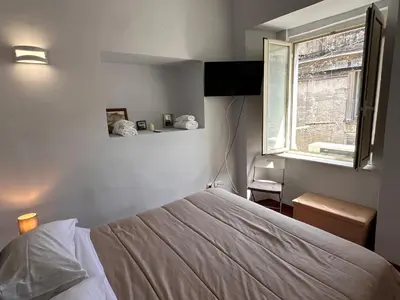 Letto o letti in una camera di Anima Azzurra - Historic Center