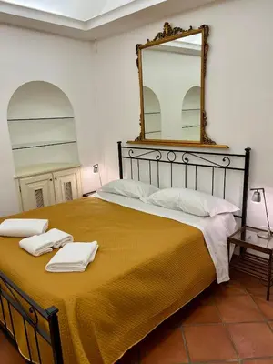 Letto o letti in una camera di Le Campanelle - Apartment in Santa Chiara