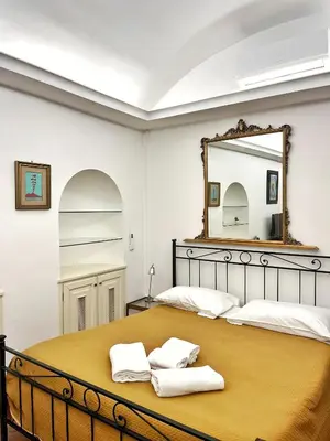 Letto o letti in una camera di Le Campanelle - Apartment in Santa Chiara