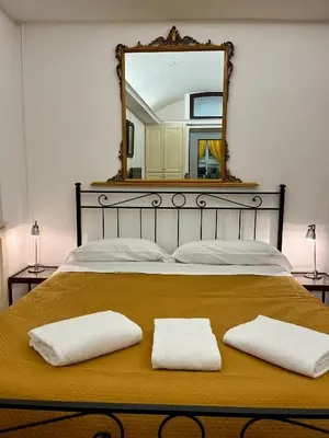 Letto o letti in una camera di Le Campanelle - Apartment in Santa Chiara