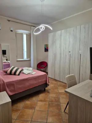 Letto o letti in una camera di Domus Bovio - Nel cuore di Napoli