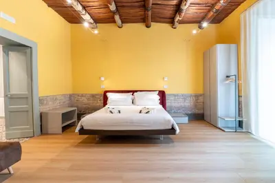 Letto o letti in una camera di Il Disinganno - Elegant Historic Residence in the center