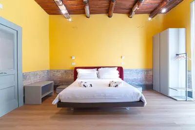 Letto o letti in una camera di Il Disinganno - Elegant Historic Residence in the center
