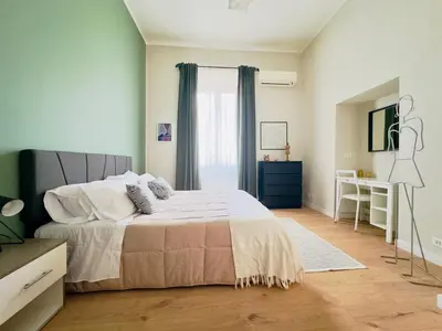 Letto o letti in una camera di Casetta Sole Verde