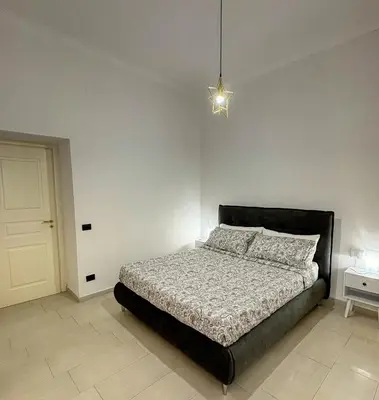 Letto o letti in una camera di Stella di San Gregorio