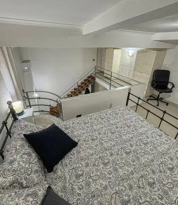 Letto o letti in una camera di Stella di San Gregorio
