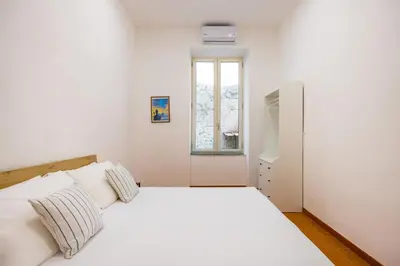 Letto o letti in una camera di Casa Pulcinella a Spaccanapoli by Wonderful Italy