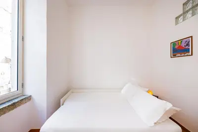 Letto o letti in una camera di Casa Pulcinella a Spaccanapoli by Wonderful Italy