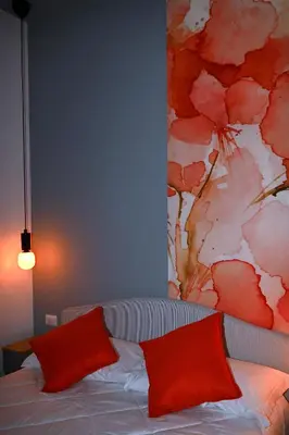 Letto o letti in una camera di Incoming Roof Bovio
