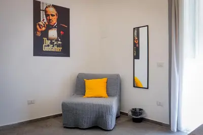 Area soggiorno di Napoli Movie Apartments