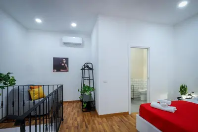 Letto o letti in una camera di Napoli Movie Apartments