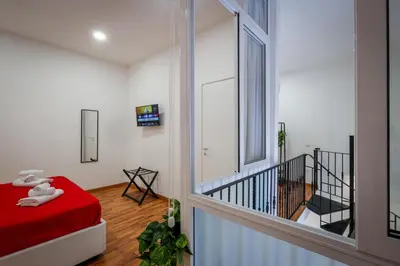 Letto o letti in una camera di Napoli Movie Apartments