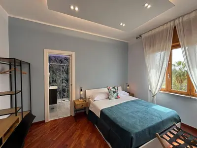 Letto o letti in una camera di Caridei Rooms