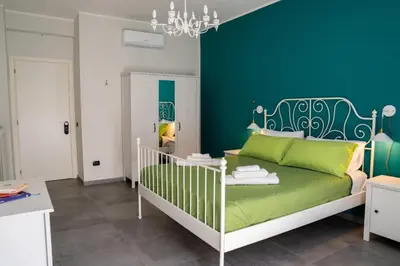 Letto o letti in una camera di B&B MilleCulure
