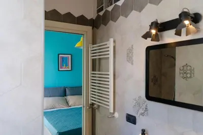 Letto o letti in una camera di B&B MilleCulure