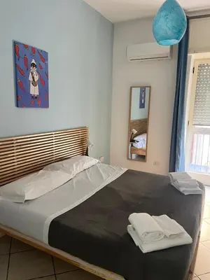 Letto o letti in una camera di Scalinatella House