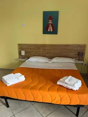 Letto o letti in una camera di Scalinatella House