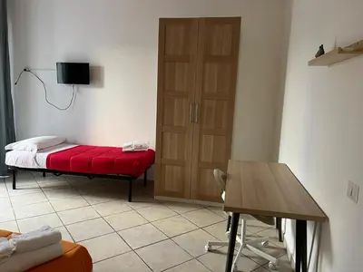 Letto o letti in una camera di Scalinatella House