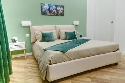 Letto o letti in una camera di La Casa dei Fiori