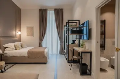 Letto o letti in una camera di Monteroduni 22 - Chiaia Design Rooms