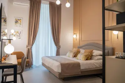 Letto o letti in una camera di Monteroduni 22 - Chiaia Design Rooms