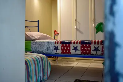 Letto o letti in una camera di Bed-Letto-Cama in Shared Room Camera Condivisa