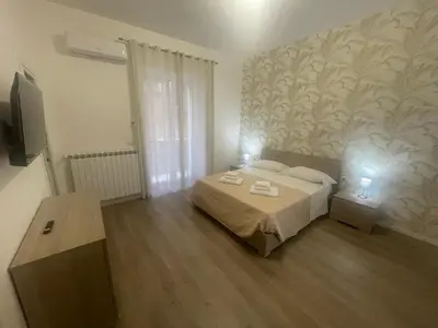 Letto o letti in una camera di da M&E rooms