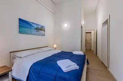 Letto o letti in una camera di Nel Cuore di Napoli
