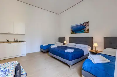 Letto o letti in una camera di Nel Cuore di Napoli