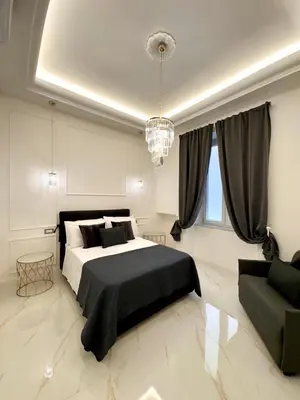 Letto o letti in una camera di Ferdinando's Home