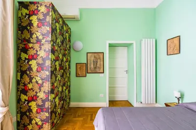 Letto o letti in una camera di Cavour Art and Museum Flat by NapoliApartments