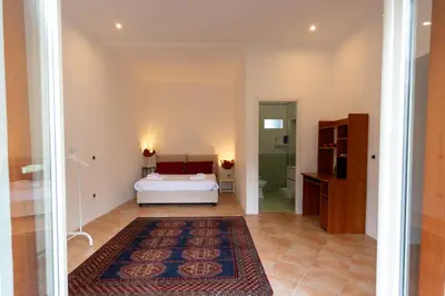 Letto o letti in una camera di Vico Santa Maria del Pozzo 9
