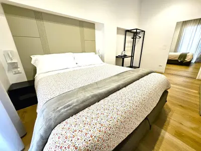 Letto o letti in una camera di Monteoliveto Place