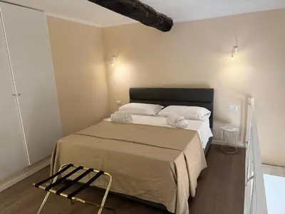 Letto o letti in una camera di Appartamento del Conte - Central Naples