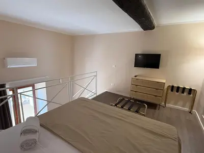 Letto o letti in una camera di Appartamento del Conte - Central Naples
