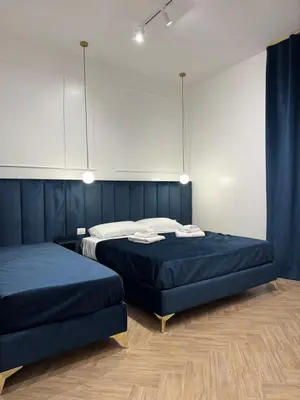 Letto o letti in una camera di Sanitá sub 32