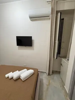 Letto o letti in una camera di VALENTINO 48 napoli centro