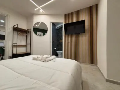 Letto o letti in una camera di Dimora della Vicaria