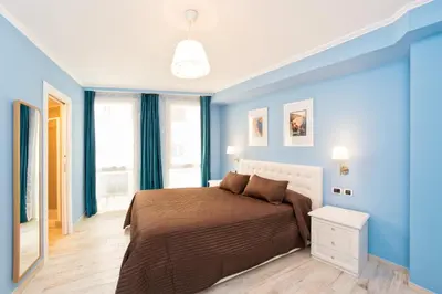 Letto o letti in una camera di CasAlice B&B Napoli