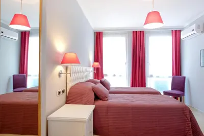 Letto o letti in una camera di CasAlice B&B Napoli