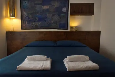Letto o letti in una camera di Dimora Dei Giganti