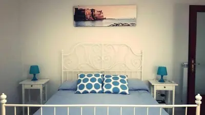Letto o letti in una camera di Napulè