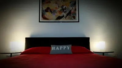 Letto o letti in una camera di Napulè