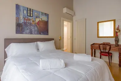 Letto o letti in una camera di Heart of Naples By Dimorra