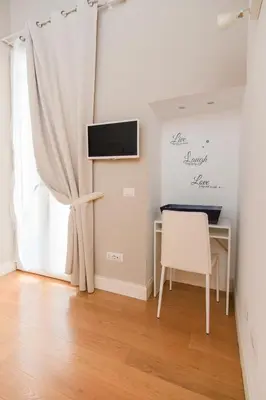 TV o dispositivi per l'intrattenimento presso Heart of Naples By Dimorra