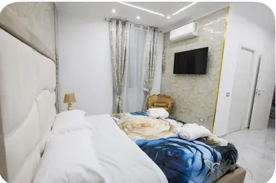 Letto o letti in una camera di B&B luxury house gold