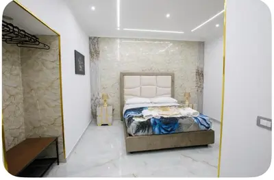Letto o letti in una camera di B&B luxury house gold