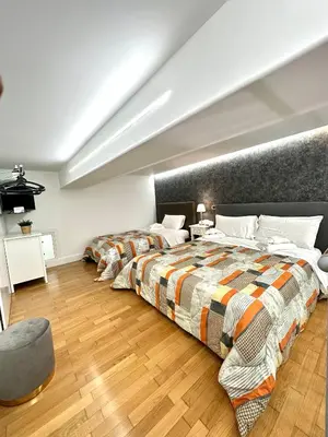 Letto o letti in una camera di Napoli Binario 1 Tribunali