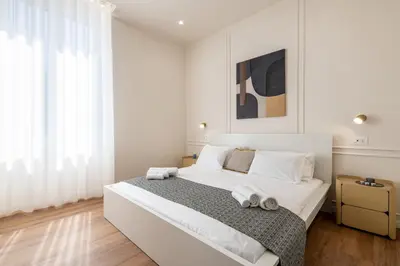Letto o letti in una camera di Coreammare Home